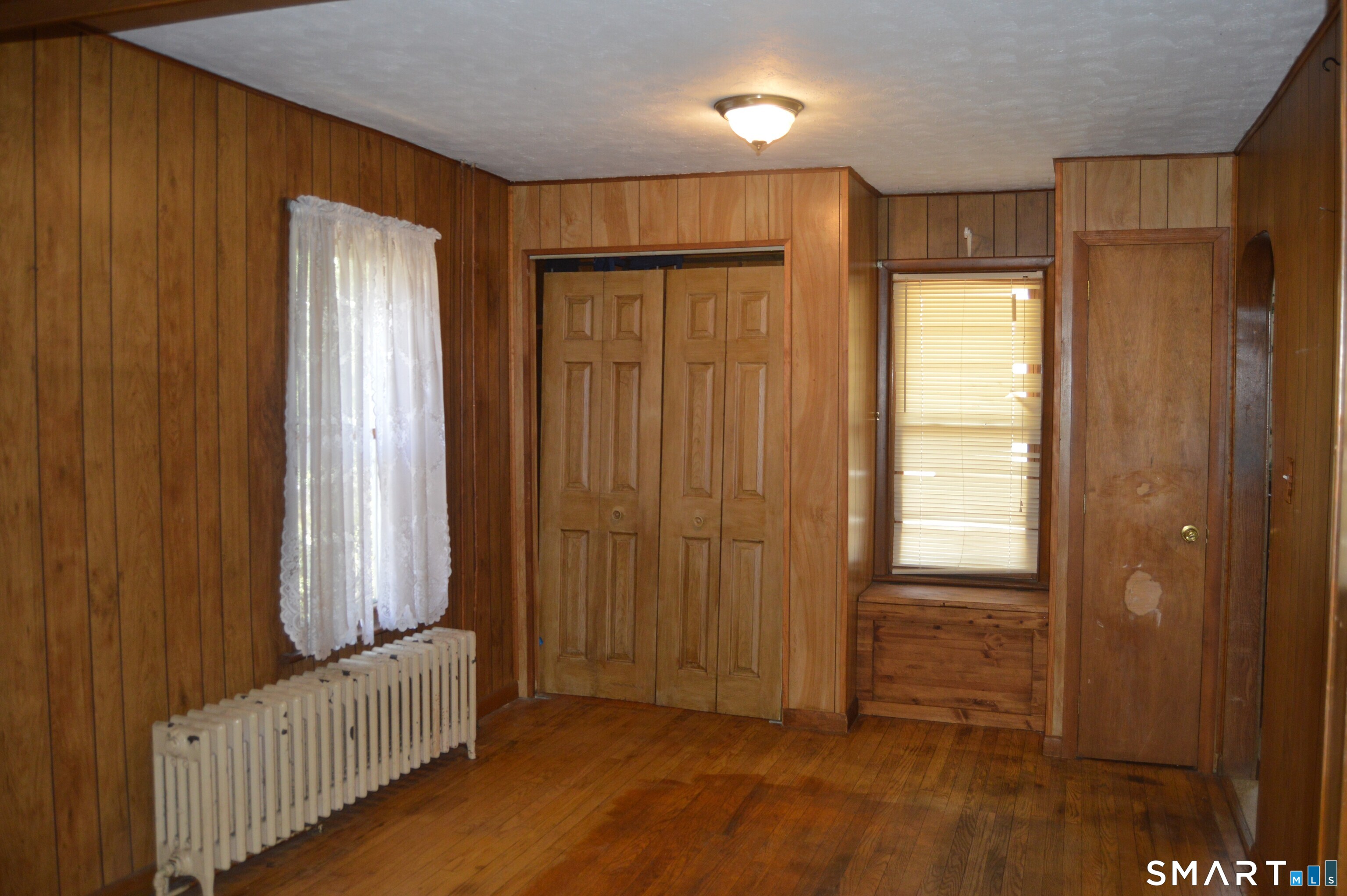 284 Main Street Berlin, CT 06023 - Photo 16 of 28 wooden floor and windows in a room