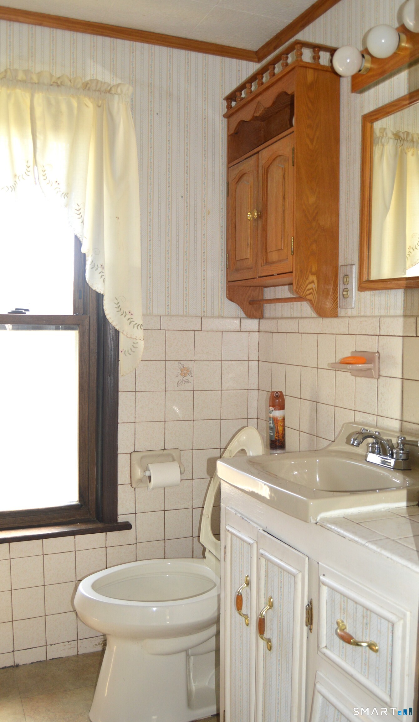 284 Main Street Berlin, CT 06023 - Photo 27 of 28 a bathroom with a sink a toilet and shower