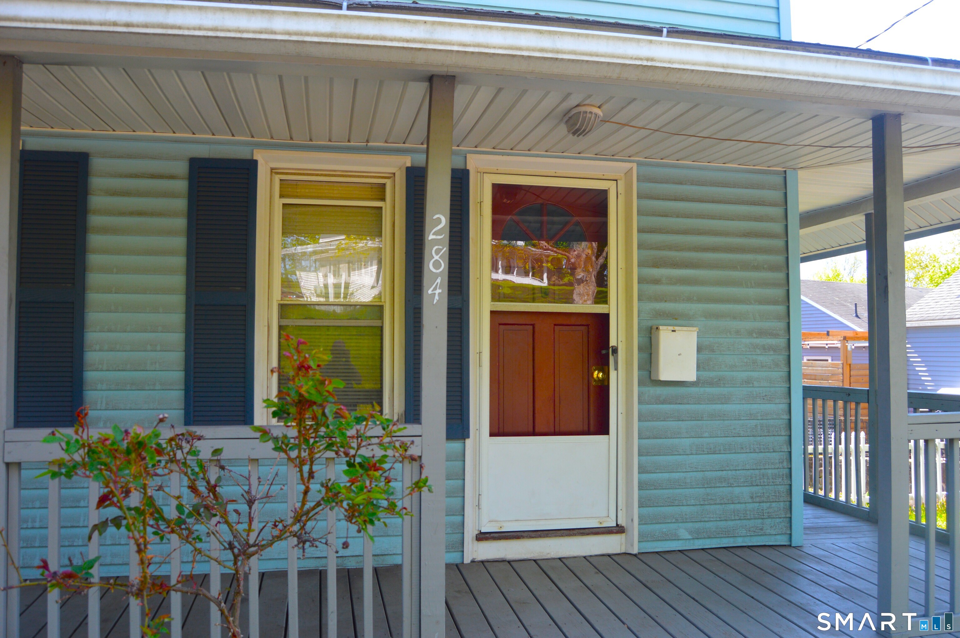 284 Main Street Berlin, CT 06023 - Photo 3 of 28 a front view of a house with a porch