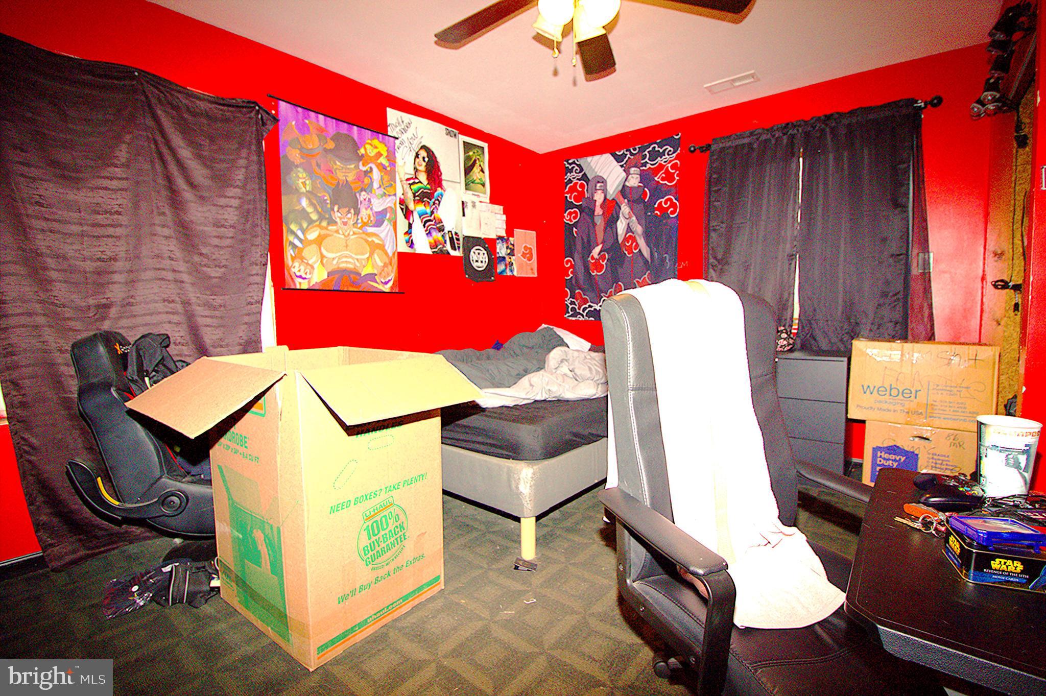 2408 Lodge Farm Road Baltimore, MD 21219 - Photo 5 of 6 a view of a room with gym equipment