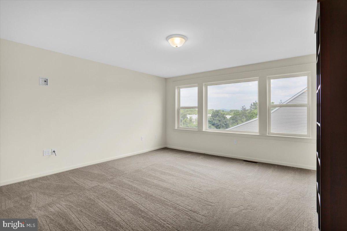 28 Calming Trail Sinking Spring, PA 19608 - Photo 27 of 43 an empty room with windows and closet