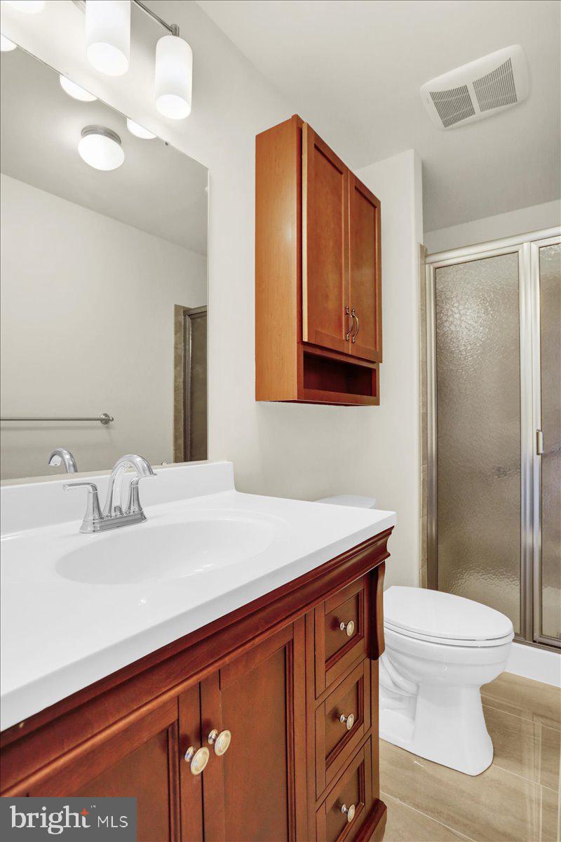 28 Calming Trail Sinking Spring, PA 19608 - Photo 30 of 43 a bathroom with a sink a toilet and shower