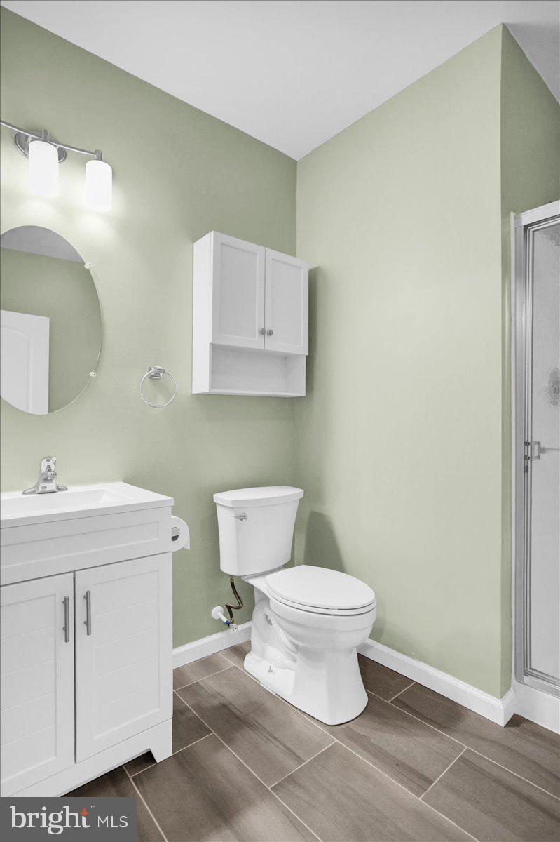 28 Calming Trail Sinking Spring, PA 19608 - Photo 37 of 43 a bathroom with a toilet sink and mirror