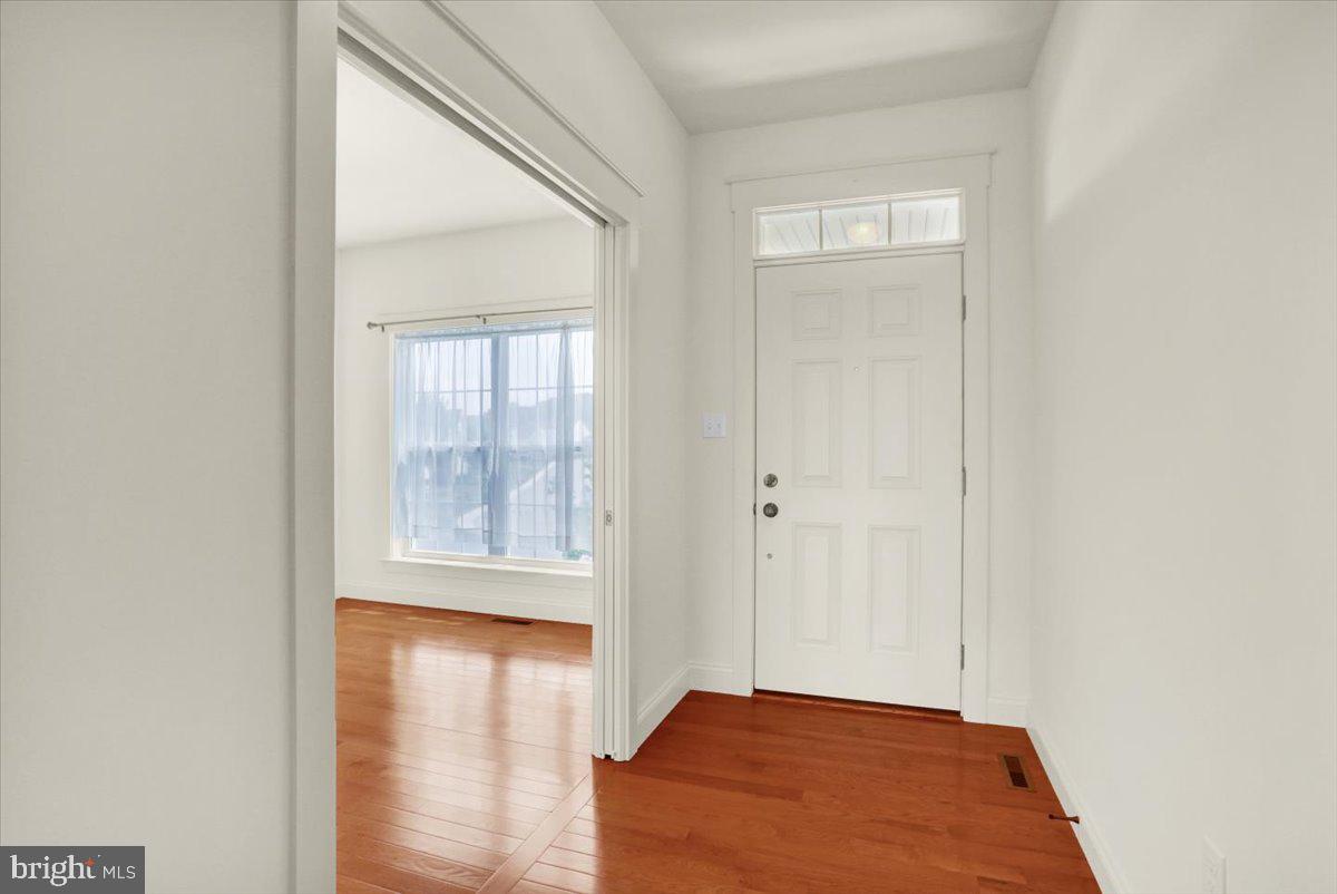 28 Calming Trail Sinking Spring, PA 19608 - Photo 5 of 43 a view of empty room with wooden floor and fan