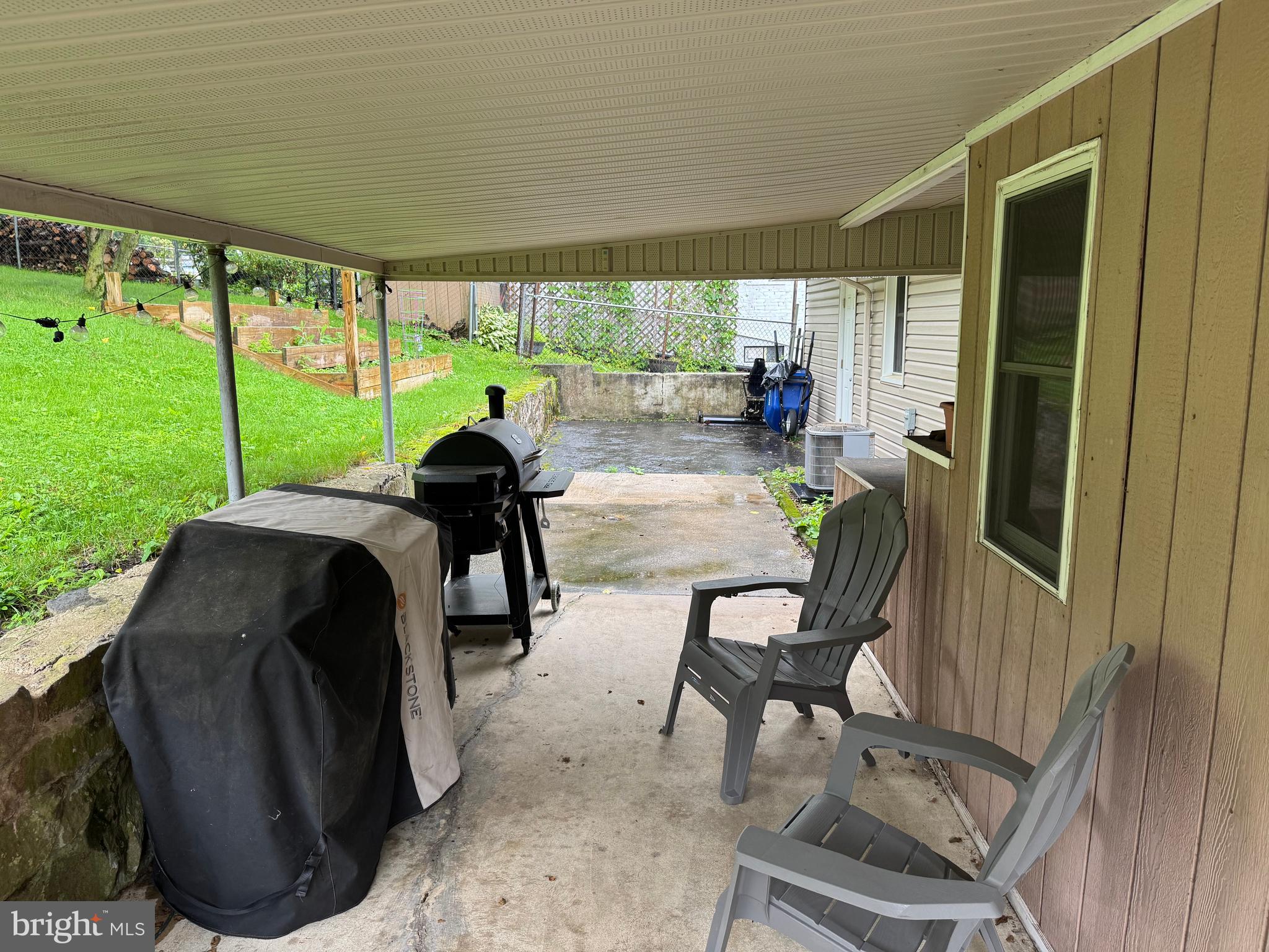 42 Reed Street Mohnton, PA 19540 - Photo 17 of 17 a view of a porch with chairs and backyard