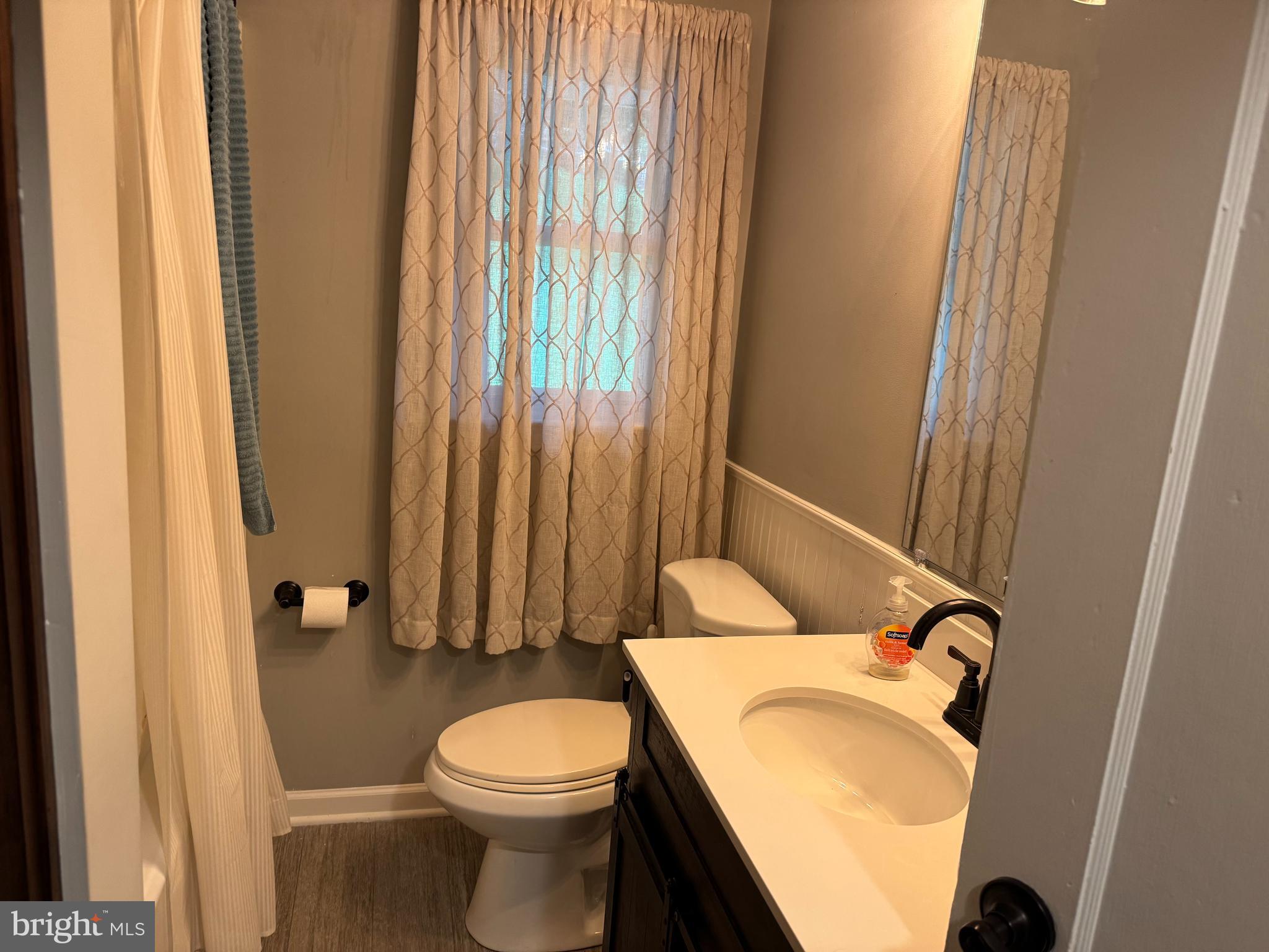 42 Reed Street Mohnton, PA 19540 - Photo 7 of 17 a bathroom with a sink a toilet and tub