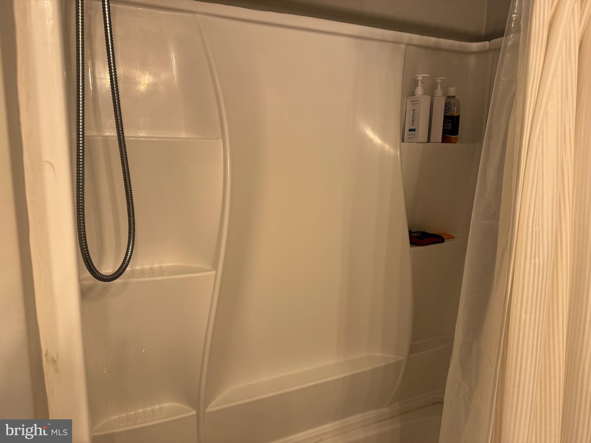 42 Reed Street Mohnton, PA 19540 - Photo 8 of 17 a bathroom with a glass shower door
