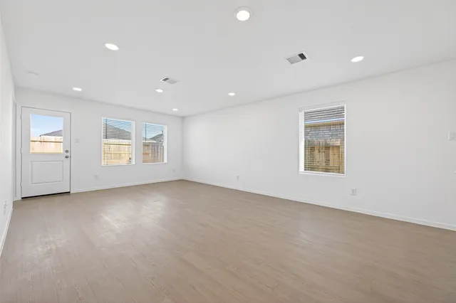 an empty room with windows