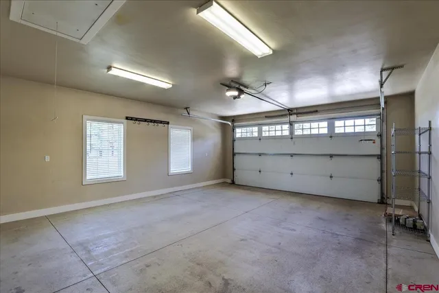 a view of an empty room with windows
