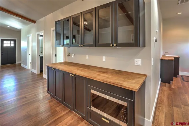 a kitchen with stainless steel appliances granite countertop a stove and a sink