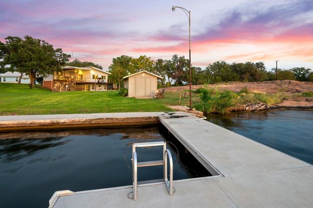 a view of a terrace with a lake view