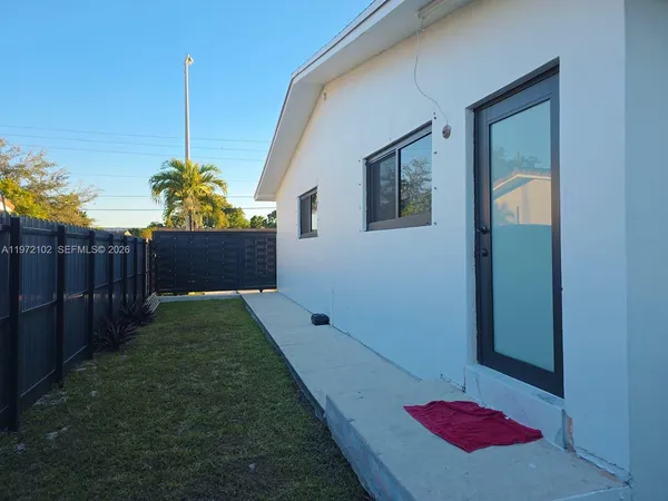 a house view with a garden space