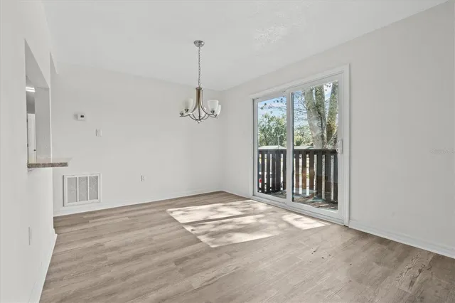 a view of an empty room and window