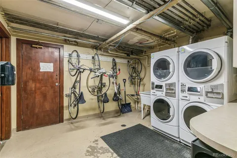 a utility room with dryer washer and dryer