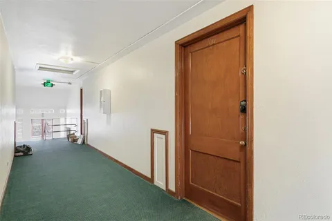a view of a hallway with closet