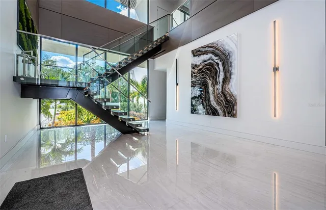 a view of a livingroom with furniture and a fireplace