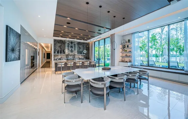 a bedroom with a bed and a table