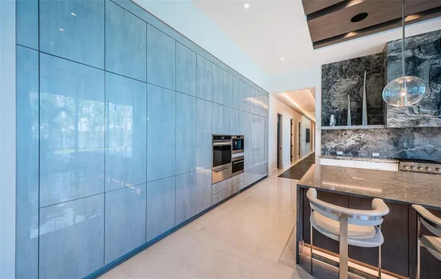 a view of gallery with wooden floor