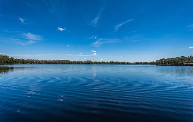 a stove top oven sitting inside of a kitchen