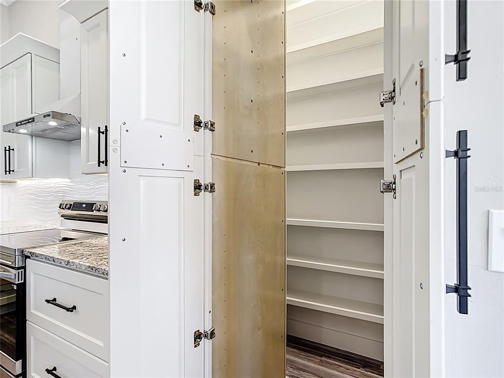 10588 Kidron Avenue Englewood, FL 34224 - Photo 14 of 53 a view of kitchen with white cabinets and white appliances