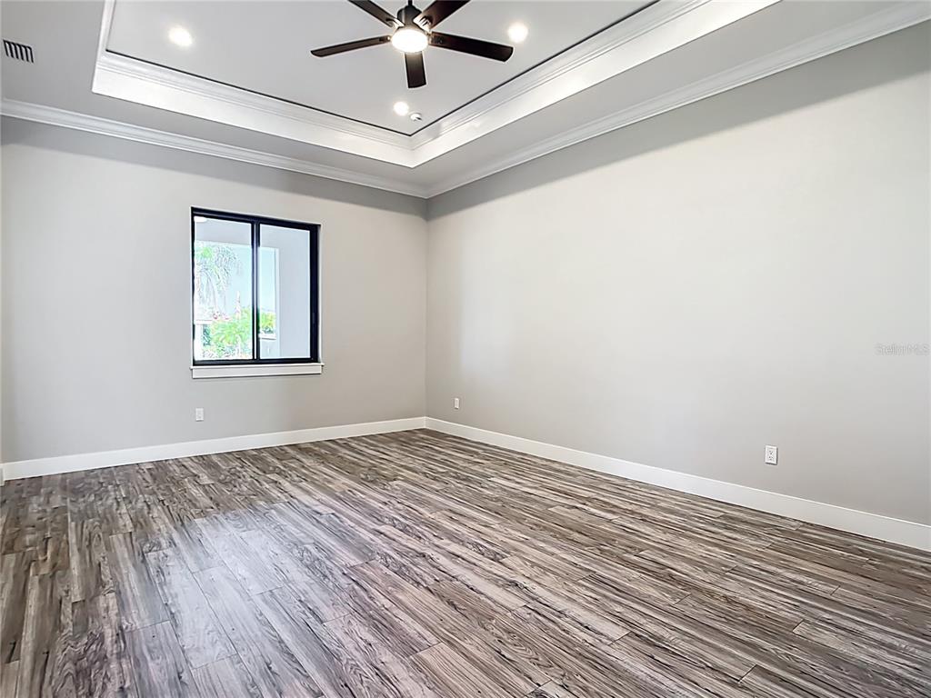 10588 Kidron Avenue Englewood, FL 34224 - Photo 17 of 53 wooden floor in an empty room