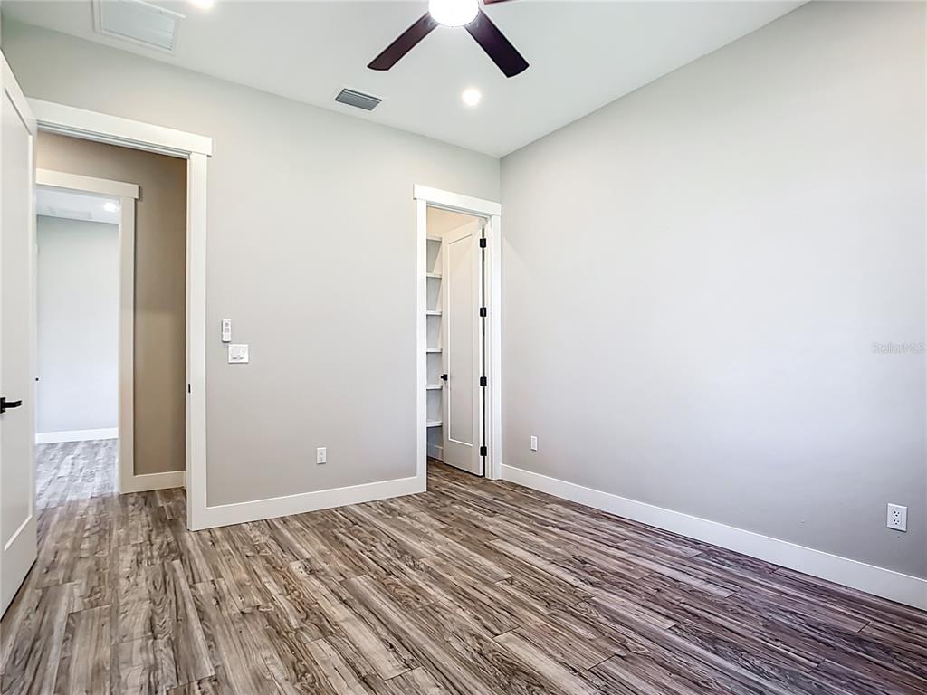 10588 Kidron Avenue Englewood, FL 34224 - Photo 22 of 53 wooden floor in an empty room