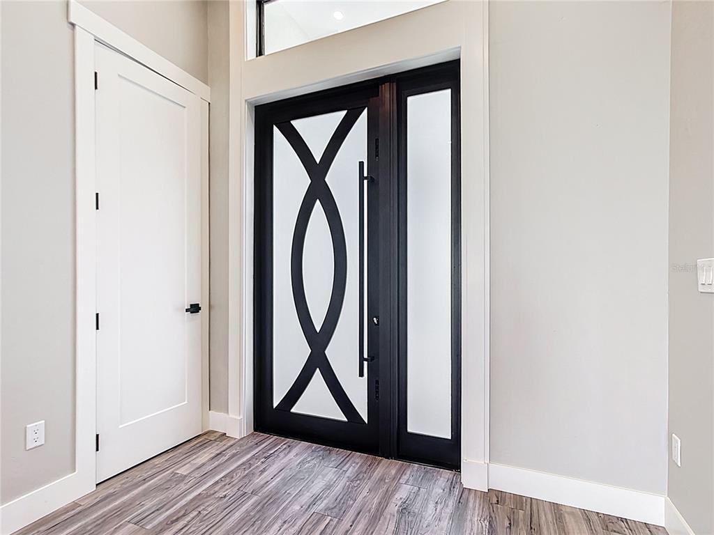 10588 Kidron Avenue Englewood, FL 34224 - Photo 4 of 53 a view of front door with wooden floor