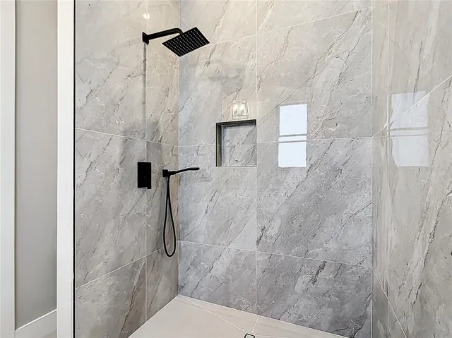 a view of a hallway with a window