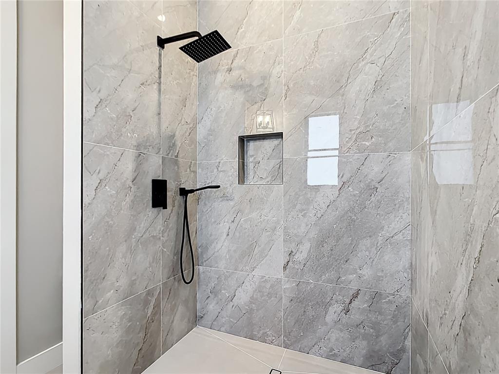 10588 Kidron Avenue Englewood, FL 34224 - Photo 41 of 53 a bathroom with a shower