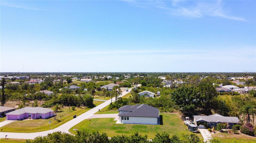 10588 Kidron Avenue Englewood, FL 34224 - Photo 52 of 53 an aerial view of residential houses with outdoor space