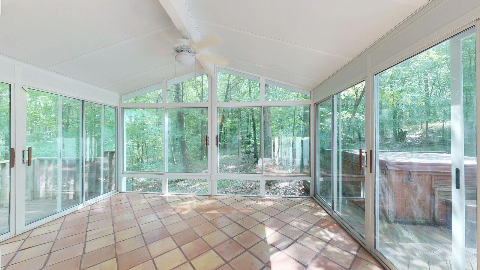 5831 Cane Ridge Road Antioch, TN 37013 - Photo 20 of 30 a room with a large window and a bed