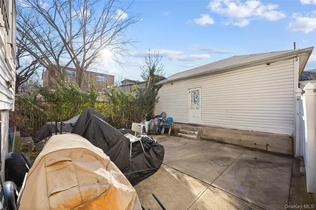 a view of a house with a parking area