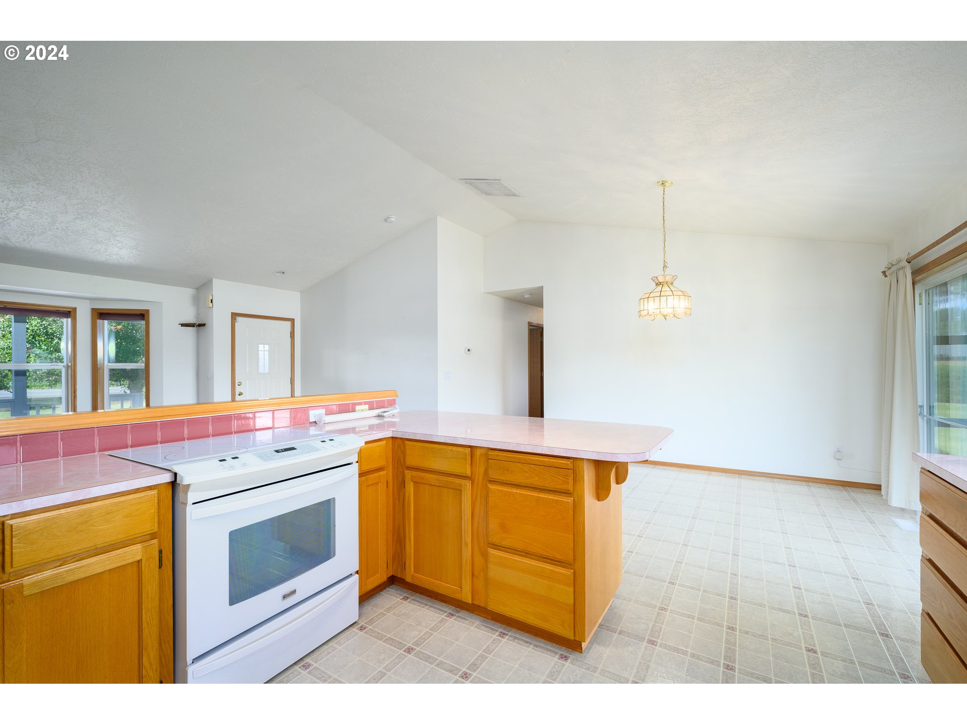 48420 Southwest Hebo Road Grand Ronde, OR 97347 - Photo 13 of 48 a kitchen with a stove and a sink