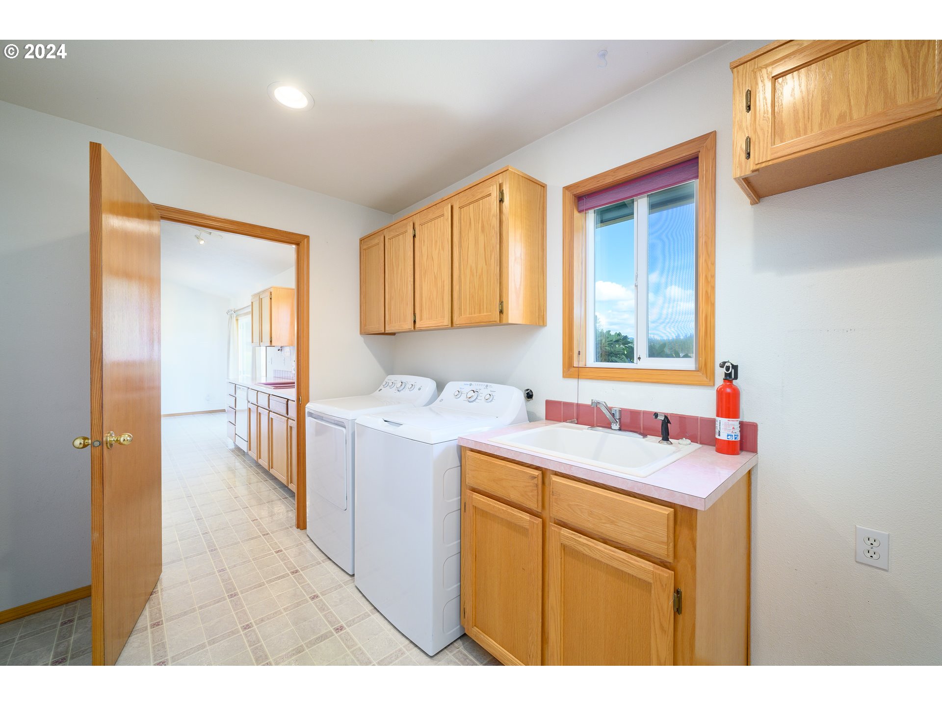 48420 Southwest Hebo Road Grand Ronde, OR 97347 - Photo 16 of 48 a utility room with a sink and cabinets