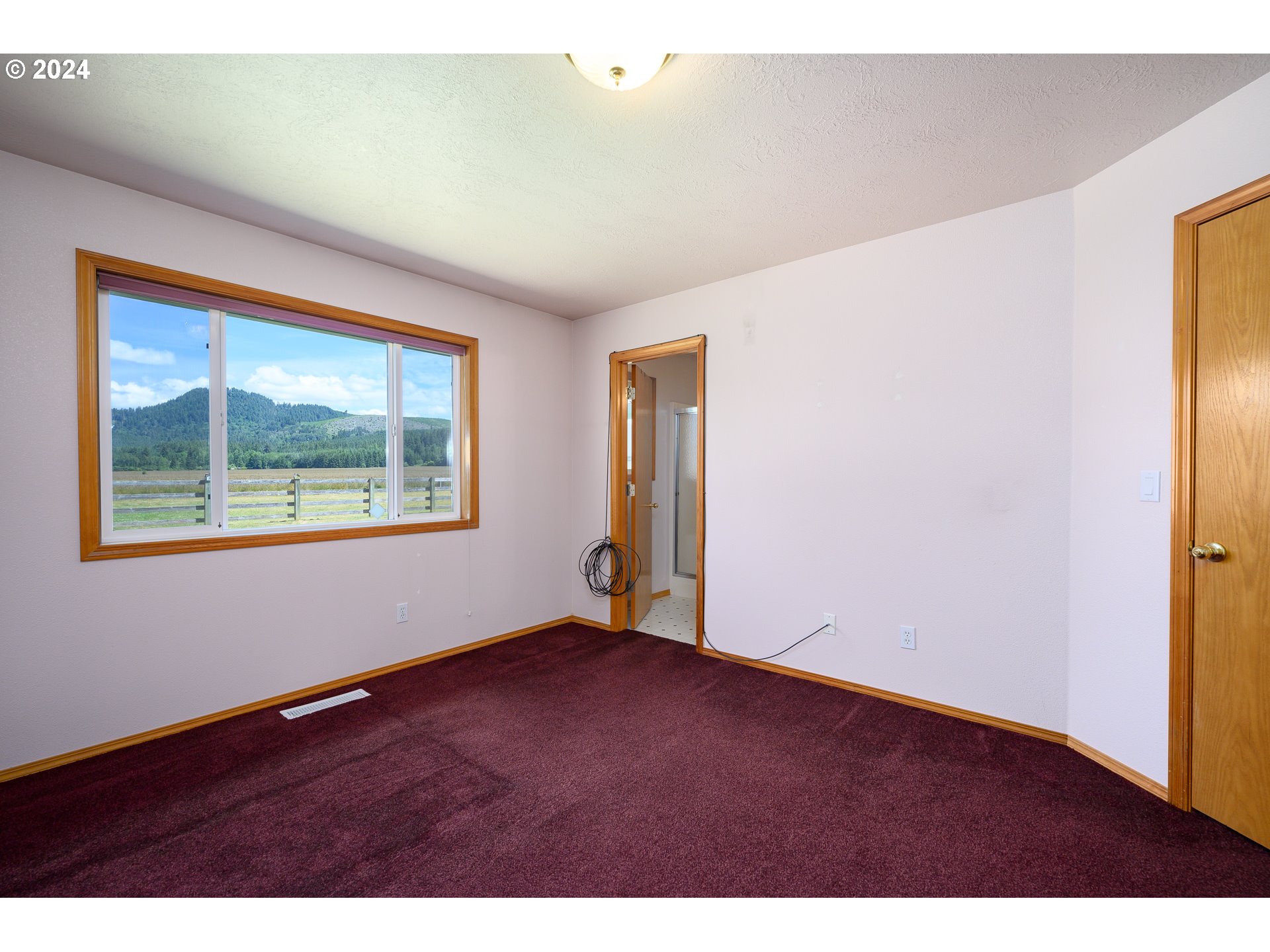 48420 Southwest Hebo Road Grand Ronde, OR 97347 - Photo 18 of 48 a view of an empty room with window