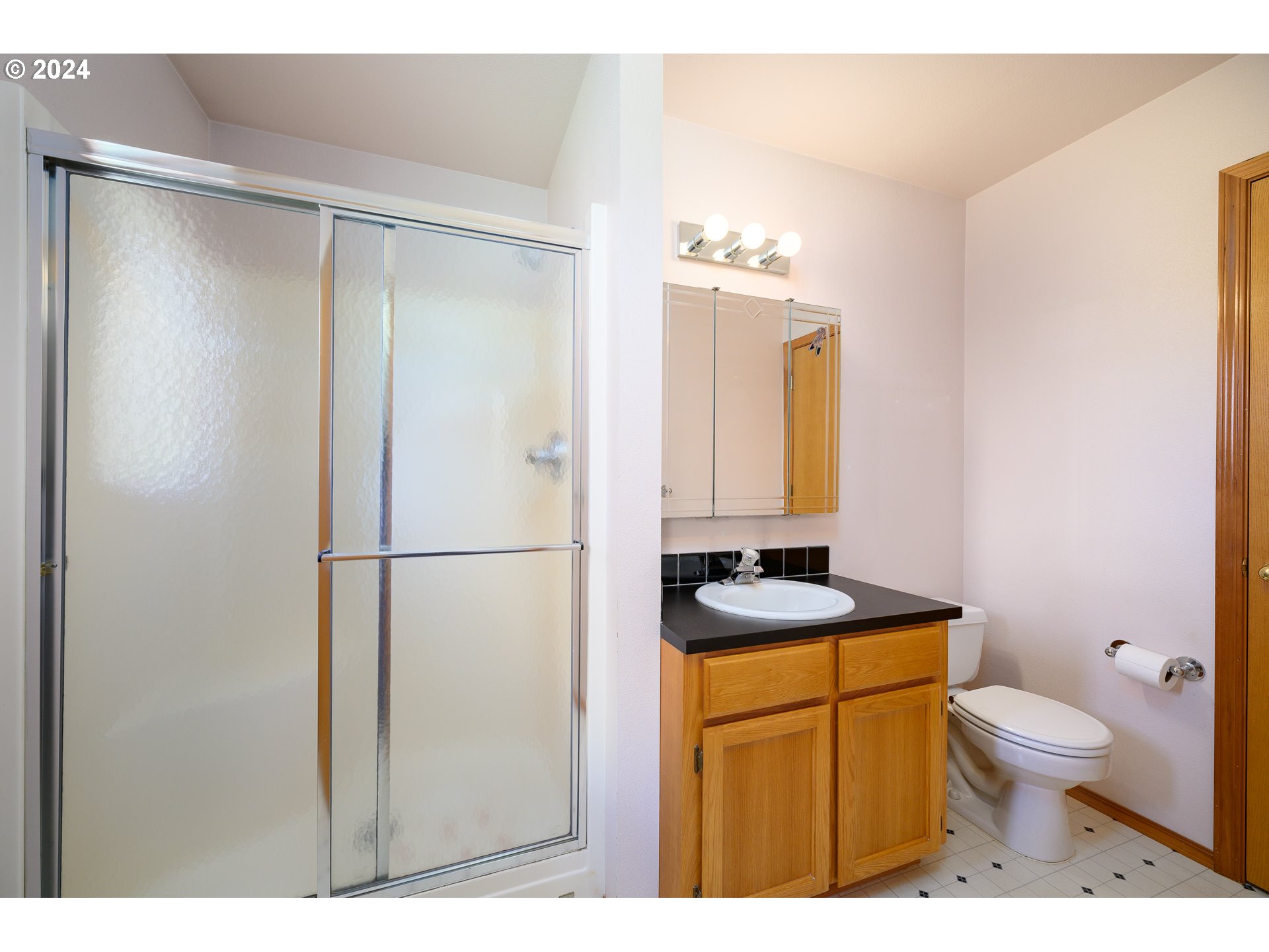 48420 Southwest Hebo Road Grand Ronde, OR 97347 - Photo 19 of 48 a bathroom with a granite countertop sink toilet and shower