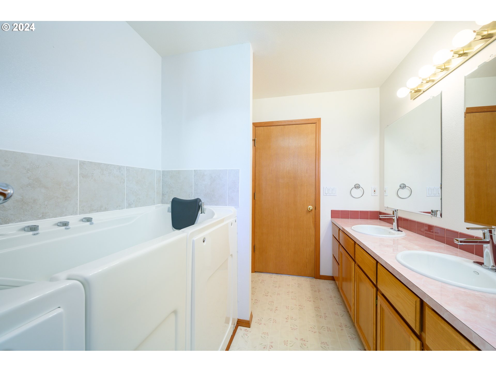 48420 Southwest Hebo Road Grand Ronde, OR 97347 - Photo 25 of 48 a bathroom with a sink and a mirror