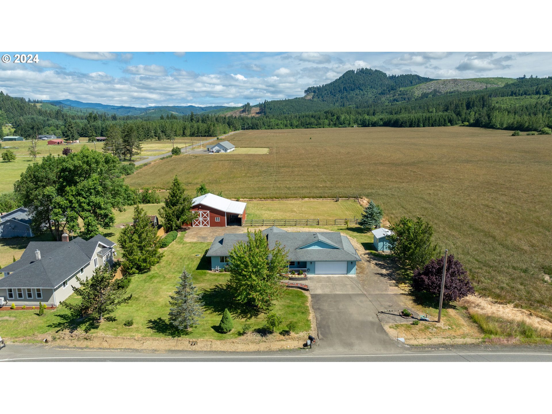 48420 Southwest Hebo Road Grand Ronde, OR 97347 - Photo 27 of 48 an aerial view of a house with a lake view