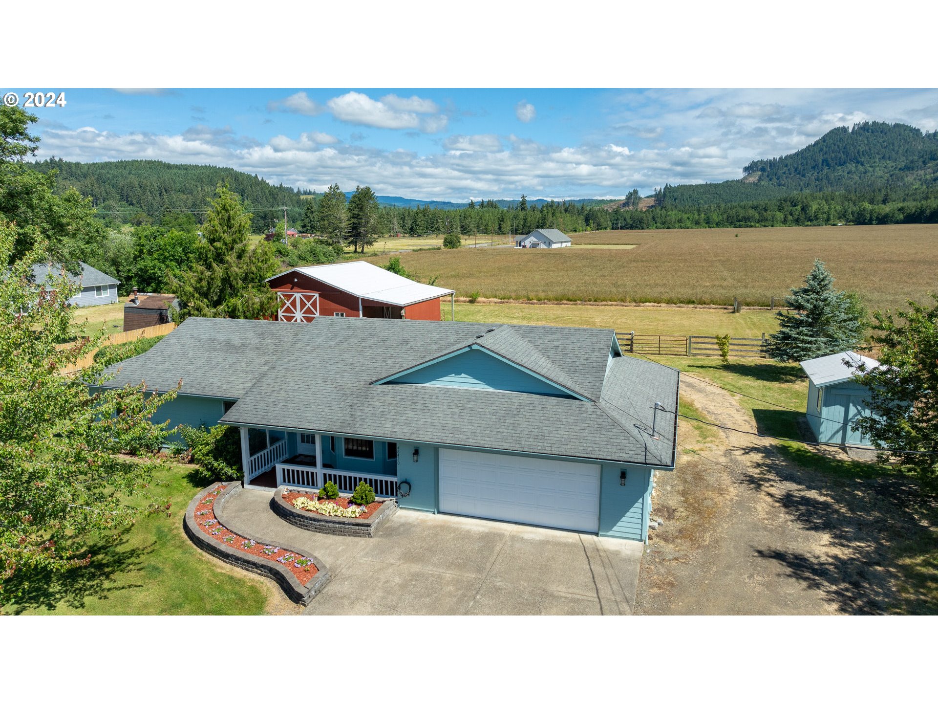 48420 Southwest Hebo Road Grand Ronde, OR 97347 - Photo 3 of 48 a aerial view of a house with outdoor space patio and lake view