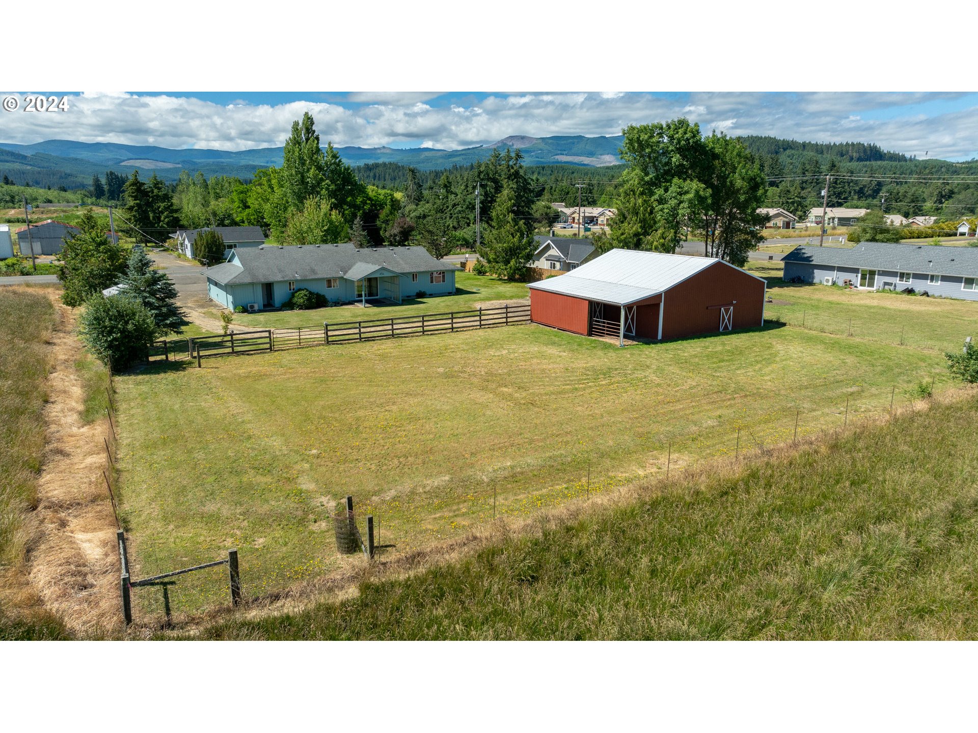 48420 Southwest Hebo Road Grand Ronde, OR 97347 - Photo 45 of 48 a balcony with an outdoor space and seating area