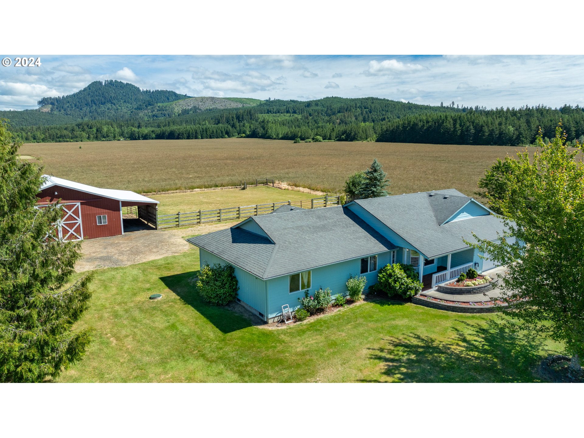 48420 Southwest Hebo Road Grand Ronde, OR 97347 - Photo 46 of 48 a balcony with table and chairs