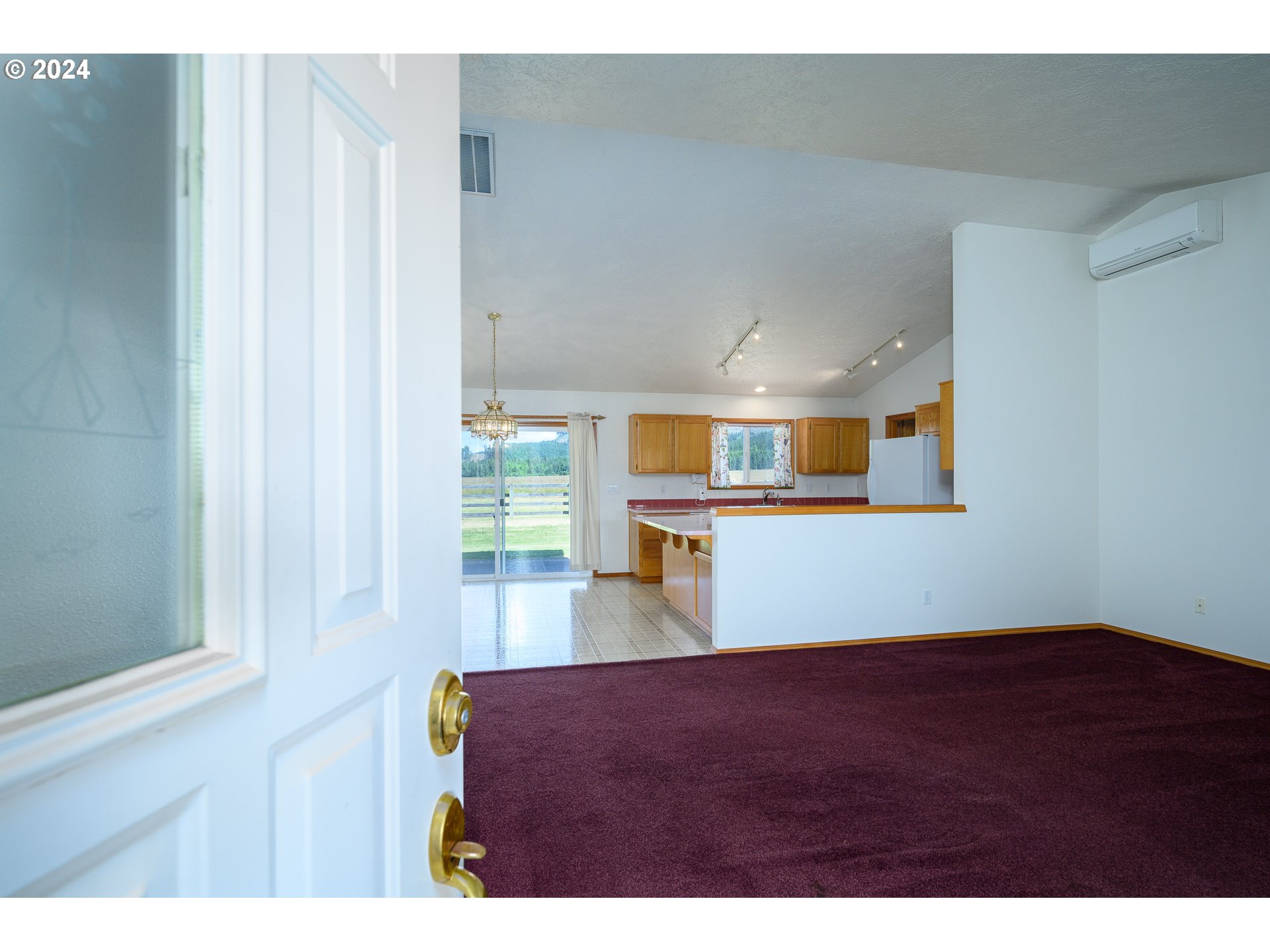 48420 Southwest Hebo Road Grand Ronde, OR 97347 - Photo 6 of 48 a view of an empty room with a window