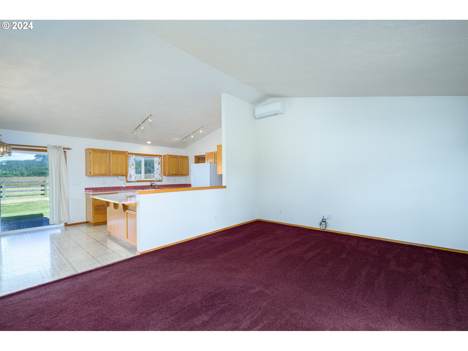 48420 Southwest Hebo Road Grand Ronde, OR 97347 - Photo 7 of 48 a view of an empty room with a window