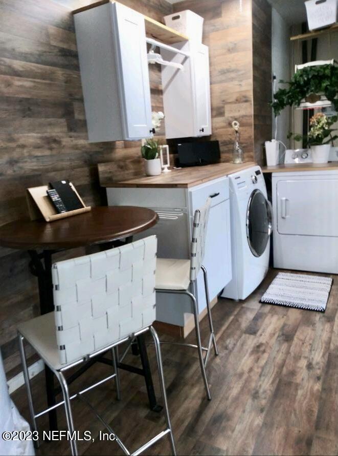 10954 Heathfield Road Jacksonville, FL 32225 - Photo 34 of 42 a utility room with cabinets