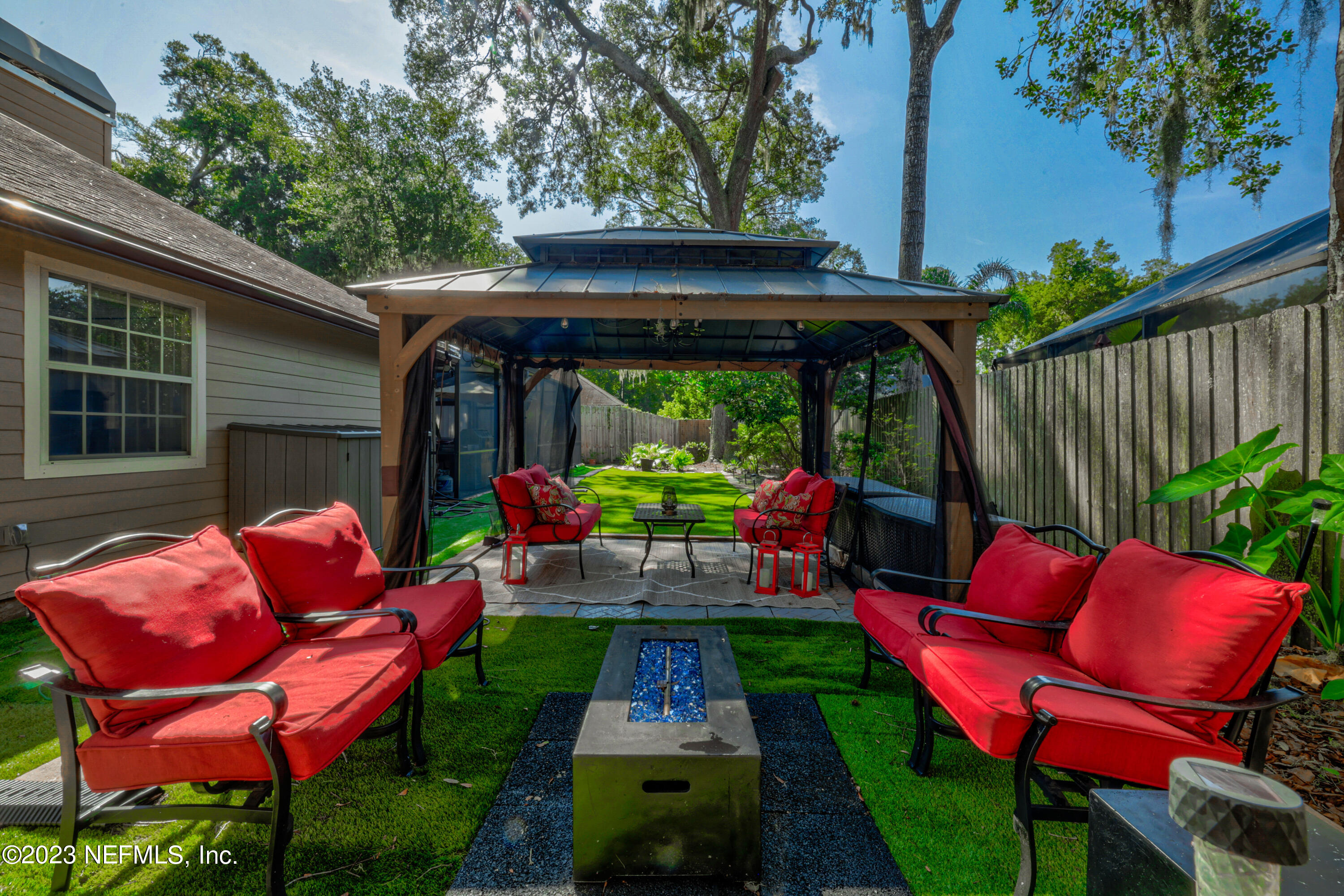 10954 Heathfield Road Jacksonville, FL 32225 - Photo 41 of 42 a view of yard with outdoor seating