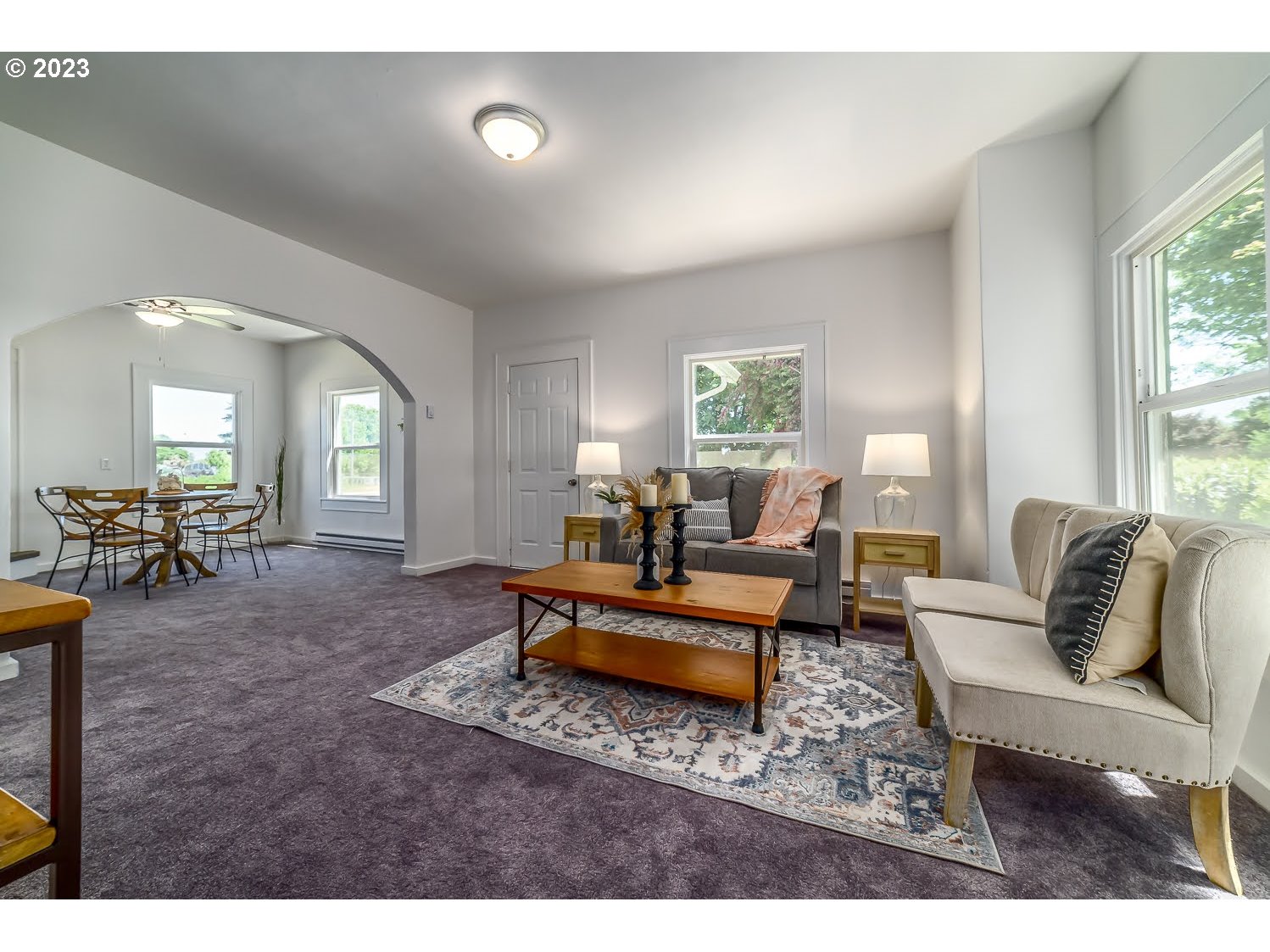 89780 Green Hill Road Eugene, OR 97402 - Photo 13 of 48 a living room with furniture and a large window