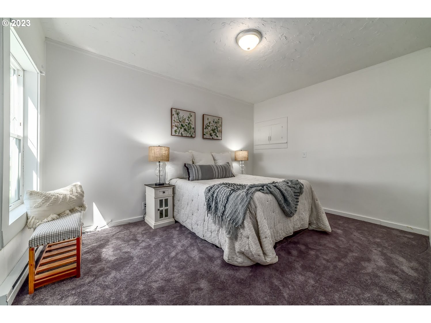 89780 Green Hill Road Eugene, OR 97402 - Photo 29 of 48 a bedroom with a bed and wooden floor