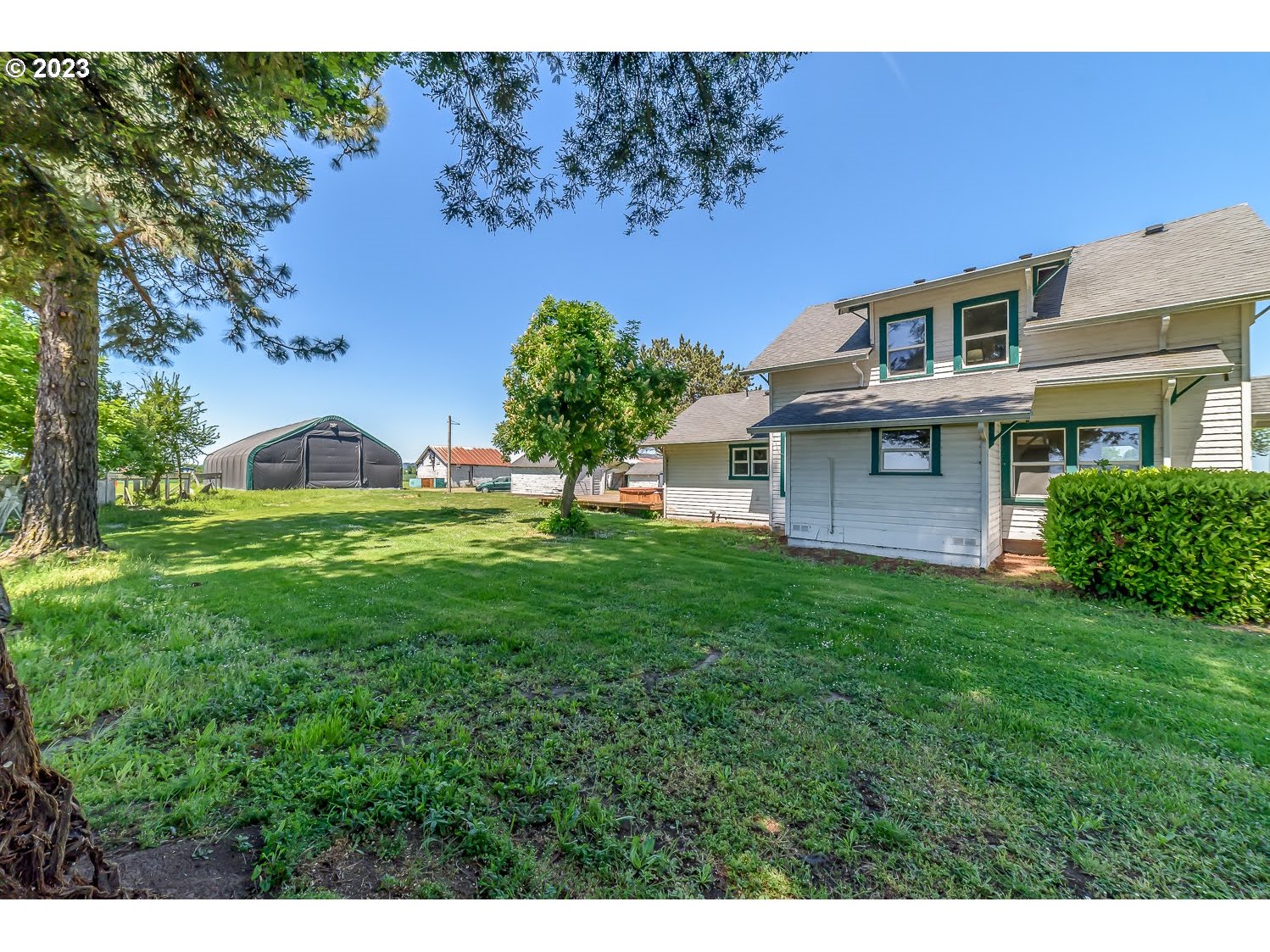 89780 Green Hill Road Eugene, OR 97402 - Photo 4 of 48 a view of a house with a backyard