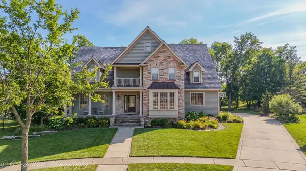 front view of a house with a yard