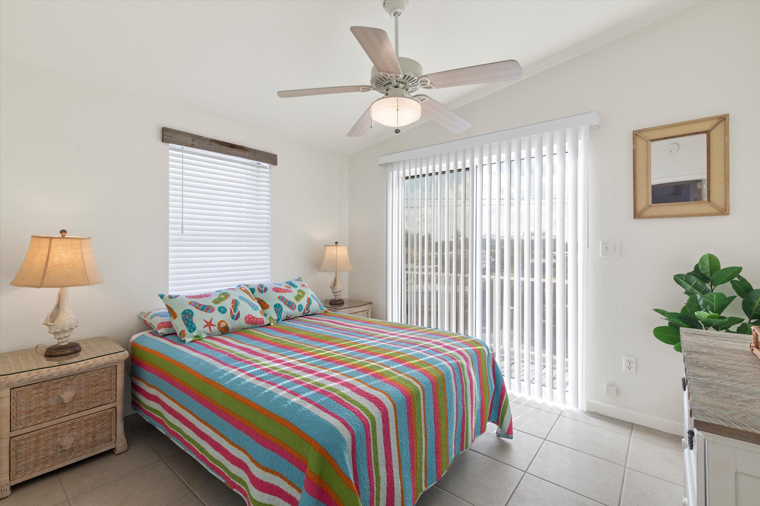 157 Mars Lane Key West, FL 33040 - Photo 24 of 41 a bedroom with bed and a window